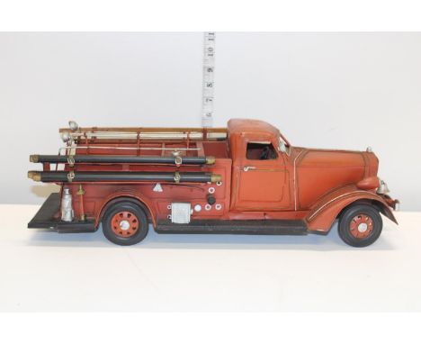 A tin plate model of a fire engine 54cm long 