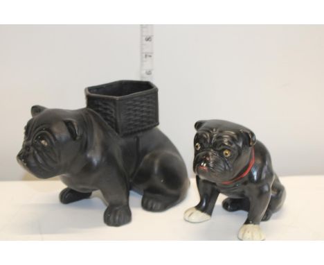 Two Victorian ceramic bull dog figures, large one is a planter 