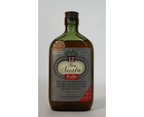 RON SIESTA RUM C. 1940'S
A rare RON SIESTA bottle from the 1940's bottled by Schenley Distilleries, Lawrenceburg, Indiana.  4