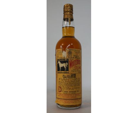 WHITE HORSE BLENDED SCOTCH C. 1960 - SPRING CAP
We estimate this bottle of WHITE HORSE BLENDED SCOTCH WHISKY to be from circa