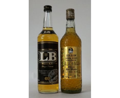 TWO EXOTIC WHISKIES
Comprising: SIKKIM HIMALAYAN PREMIUM OLD GOLD Single Malt Whisky.  70cl.. 40% abv/ 80 proof.  Level mid-n