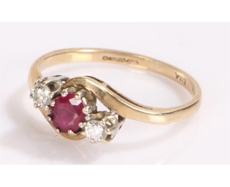 9 carat gold ruby and diamond ring, with a central ruby flanked by diamonds, ring size N