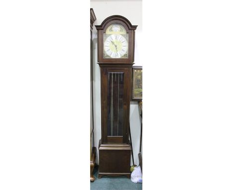 20th Century mahogany longcase clock, the arched hood above a glazed trunk door and panel base, silvered and gilt dial, Roman