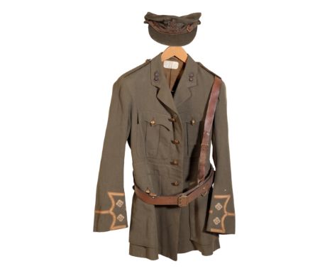 A WWI ROYAL ARTILLERY JACKET tailored by Simpson &amp; Sons of South Audley Street, London, no. 7899; a Royal Artillery cap; 
