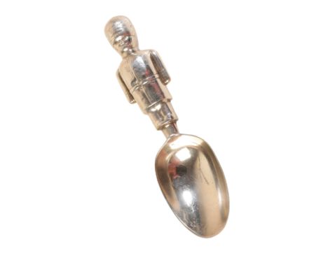 A SILVER CADDY SPOON with a handle in the form of a guardsman, 11cm longProceeds are to go to The Royal Artillery Charitable 
