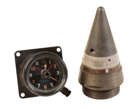 A MK II C  NAVIGATOR'S CLOCK, with a manual wind movement, luminous Arabic numerals and luminous steel and red hands, ref. no