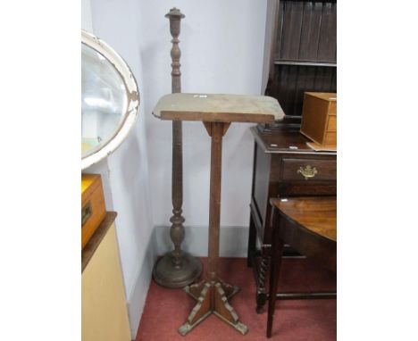 An Early XX Century Pine Lectern, on cruciform base, 113cm high, Oriental carved standard lamp. (2)