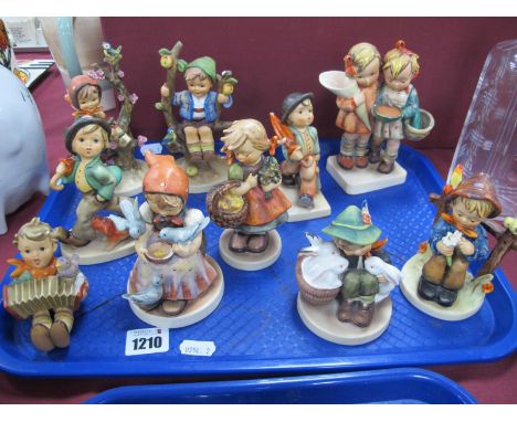 Nine Hummel Figures, including 'Playmates', firl with basket of apples, boy with daisy etc, plus one other similar:- One Tray