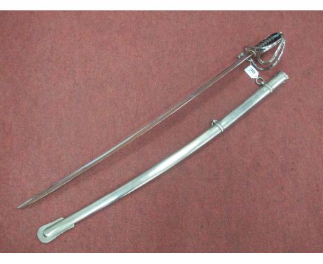 A Modern Sabre, the blade etched "John Prosser, Charring Cross, London, leather grip in scabbard.
