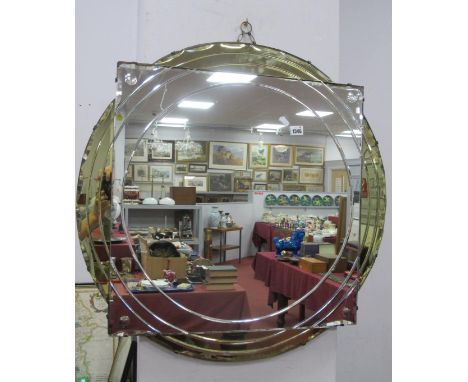 A Mid 1900's Art Deco Mirror, with green glass outer quarters and circle effect feature, 76cm diameter.