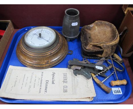 A Negretti and Zambra Oak Framed Circular Barometer, 18cm diameter, four cork screws, a pixi door knocker, a flint Mickey Mou