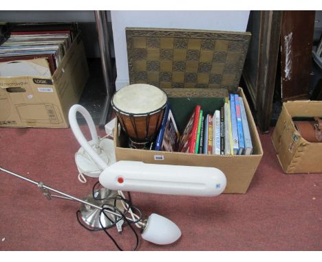 Sheffield Theamed Books, madri style drum, chess sets, two table lamps.