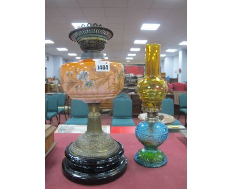 An Early XX Century Brass Oil Lamp, with black terracota base and painted glass well, a later example.