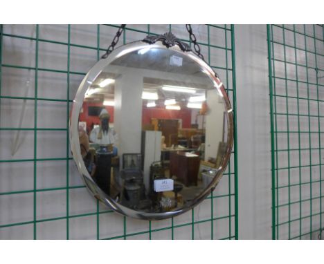 A circular Art Deco mirror 