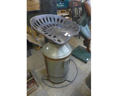 A tractor seat and milk churn bar stool 