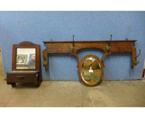 A small Victorian mahogany hall mirror and an oak mirrored coat rack 