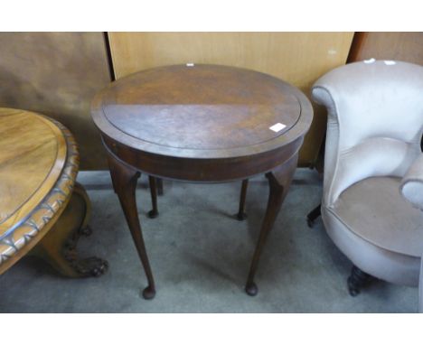An early 20th Century burr walnut circular metamorphic flip top card table 
