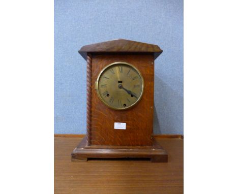 A late 19th Century oak mantle clock, the dial signed C.W. Hammonds, Derby 