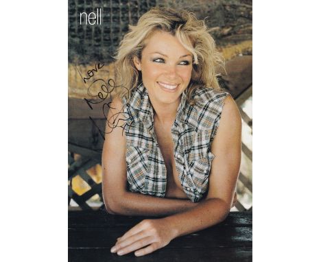 Nell McAndrew, Glamour Model &amp; TV Presenter, 8x6 Photo Signed Both Sides. Good condition. All autographs come with a Cert