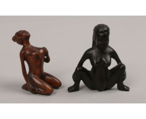 Two erotic carved wooden netsuke.