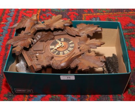 A Black Forest style cuckoo clock.Condition report intended as a guide only.In need of attention.