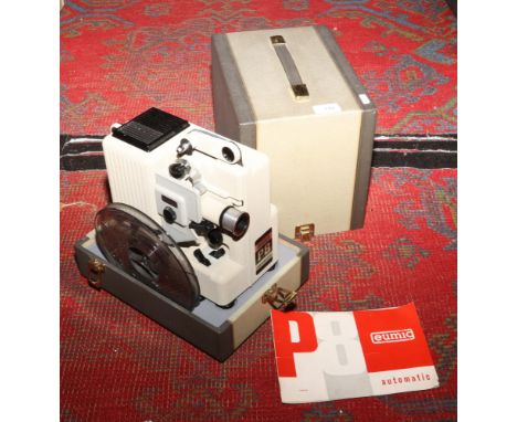 A cased Eumig P8 automatic projector with instructions.