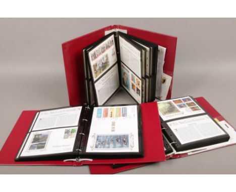 Three albums of the silk cover collection first day covers.