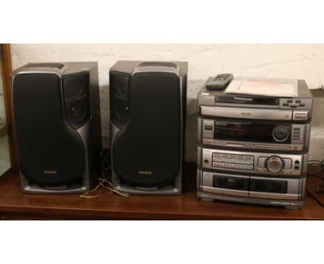 An Aiwa Z-R 800 digital audio system with manual and remote.