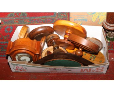 A box of treen to include turner pedestal stand, candlesticks, Australian tourist wares and a Acctim quartz Westminster chime
