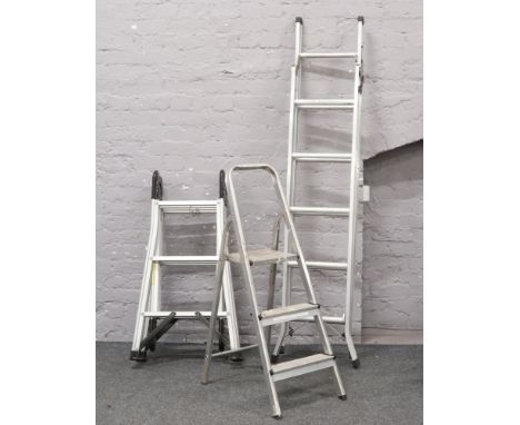 A Abru aluminium 3 way step ladder, along with a four fold multi purpose ladder and a small step ladder.
