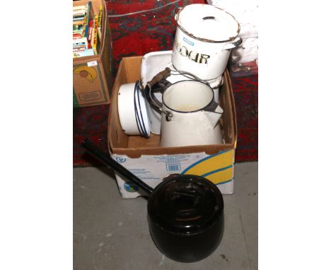 A box of enamel kitchenalia including storage containers, bread bin etc.