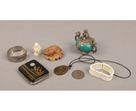 A box of oriental collectables including Chinese censor with plated mounts, jade coloured hardstone pendant and a lacquered c