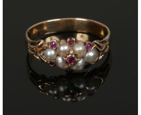 A Victorian gold, ruby and pearl cluster ring, size P 1/2.