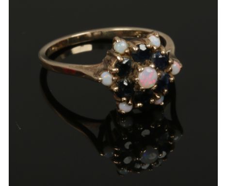 A 9ct gold opal and sapphire cluster ring, size Q.