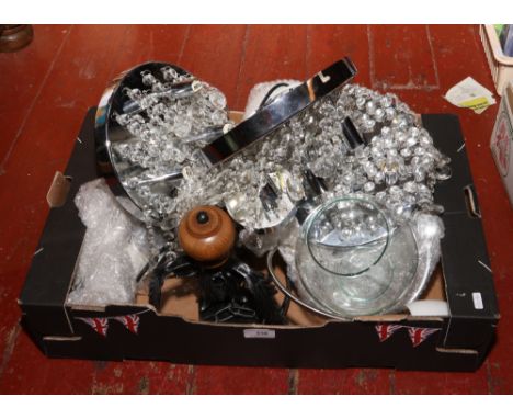 A box of assorted modern light fittings.