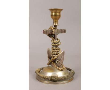 A gilded nautical themed candlestick, formed as a fowled anchor.