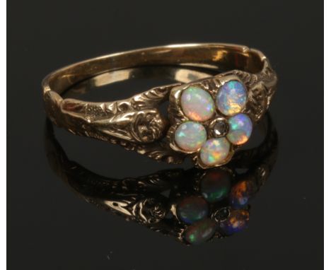 An early Victorian gold opal and diamond cluster ring, size M.