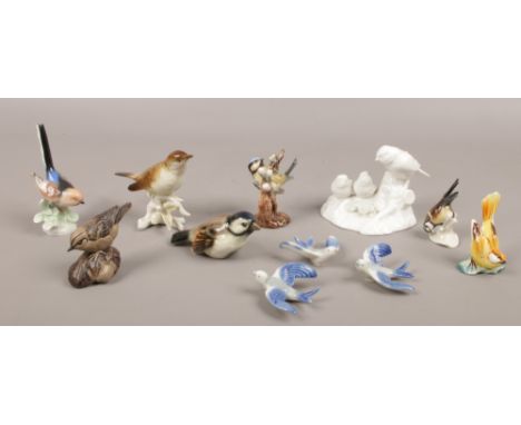 A collection of ceramic bird figures to include Goebel, Poole etc.