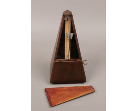 A mahogany cased Maelzel metronome.
