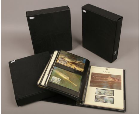 Three albums of World wide fund for nature first day covers to include Medallic examples.