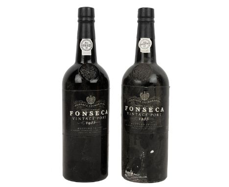 2 bottles of Fonseca vintage port 1985, 75cl 20.5% alc/vol, fill high and into neck, light scuff to labels, capsules intact. 
