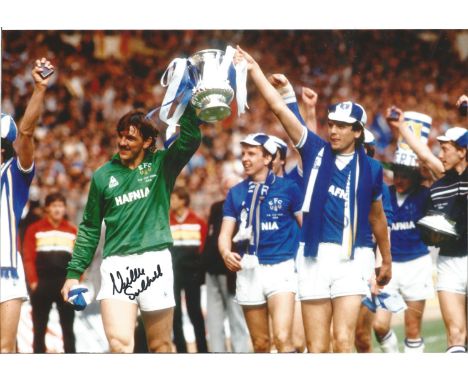 Football Neville Southall 10x8 signed colour photo celebrating winning the 1984 FA cup final with Everton. Neville Southall M