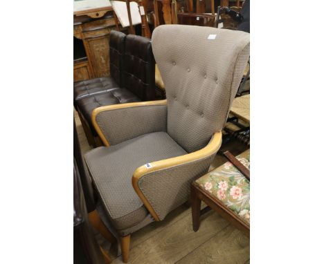 A Howard Keith button back armchair