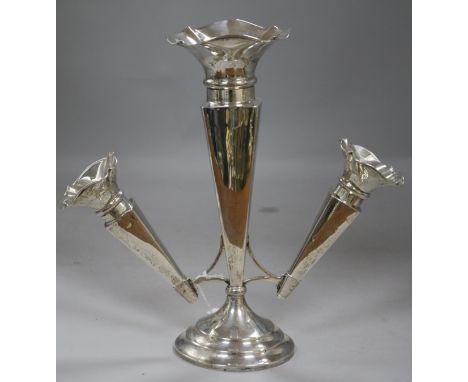 A George V silver epergne having three tapered vases with shaped everted rims (weighted), Sheffield 1917, James Deakin & Sons