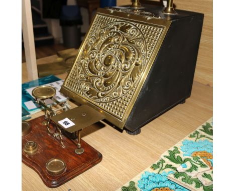 An Arts & Crafts brass purdonium and a set of brass letter scales