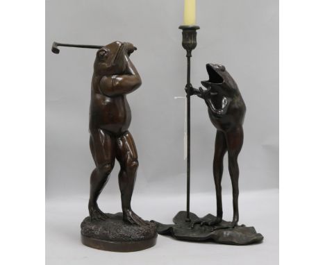 Bronze candlesticks and a golfer