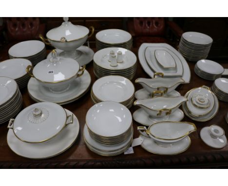 An extensive matched white-glazed and gilt-bordered part dinner service, mainly by Rosenthal but including a few pieces marke