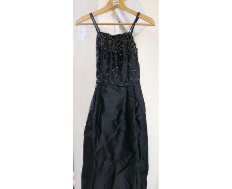 A Blanes of London vintage ball gown, black silk with bead and sequin decoration to bodice, originally size 16 and altered to