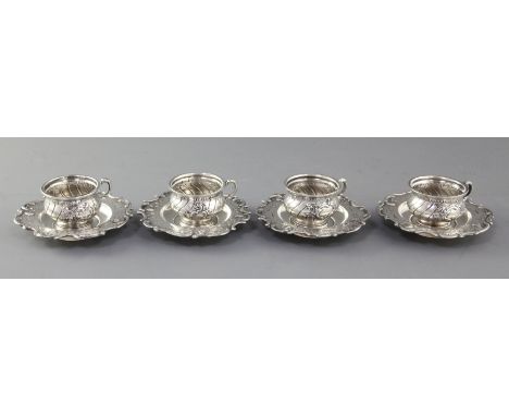 A set of four Austro-Hungarian silver coffee cups and saucers.