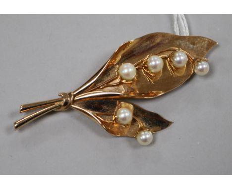 A 14ct gold and cultured pearl set foliate spray brooch, 8cm.